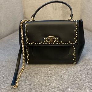 Like new ferragamo ladies bag with top handle and long chain strap